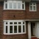 ENFIELD - BAY WINDOWS WITH DUMMY SASH AND LEAD DESIGN IN FANLIGHTS