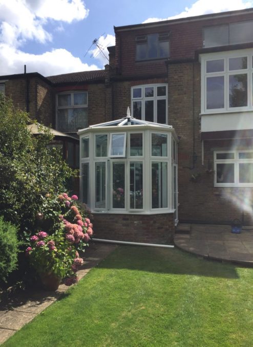 Flush sash Conservatory fitted with blue active roof glass in Southgate felt roof re done 2